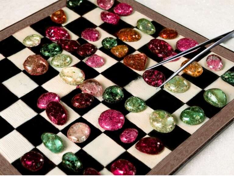 Coloured gemstones on a chess board